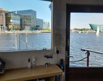 Boat with a view in center of Amsterdam